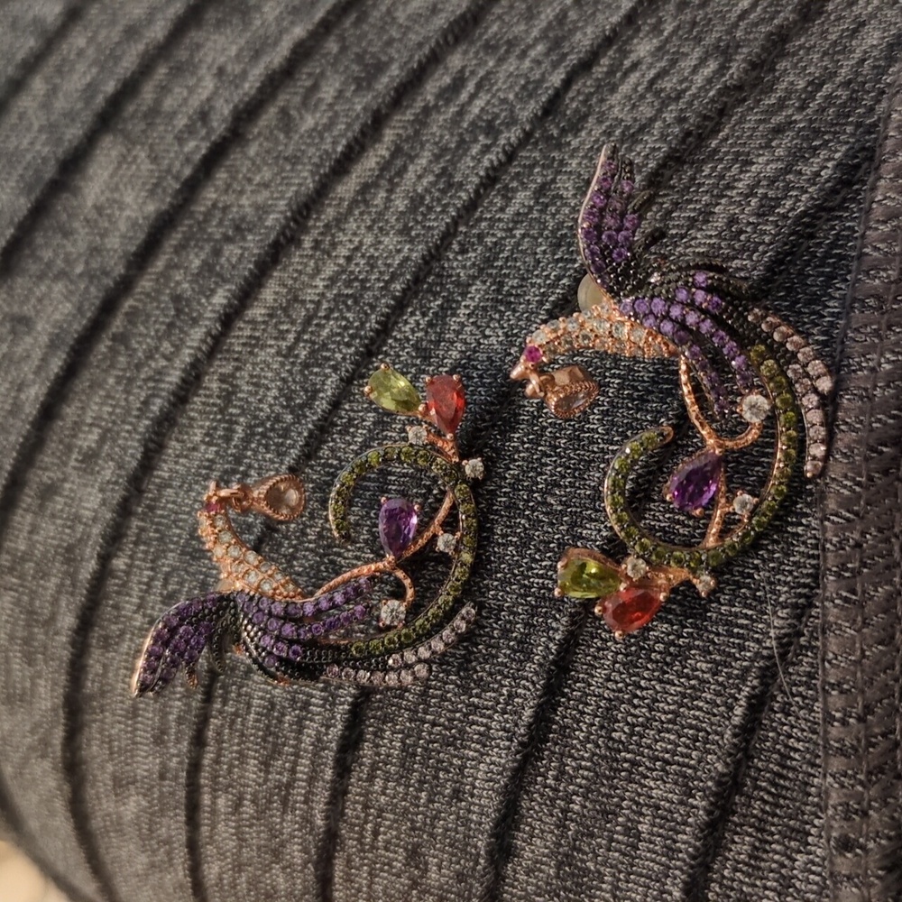 Rose gold toned Swarovski Crystal Phoenix earrings.